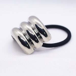 Tri-layered pony cuff