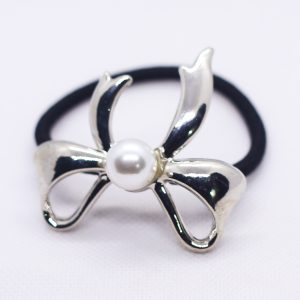 Ribbon with pearl pony cuff