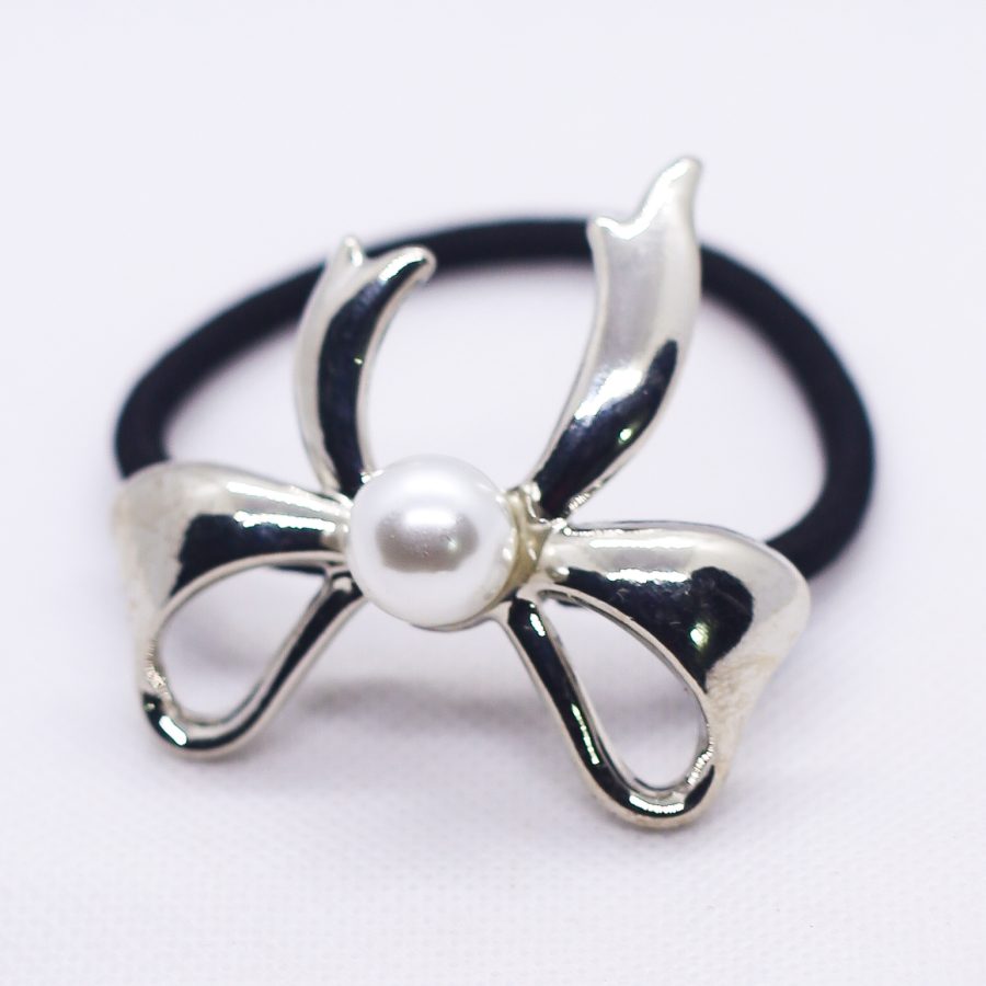 Ribbon with pearl pony cuff
