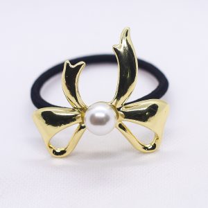 Ribbon with pearl pony cuff