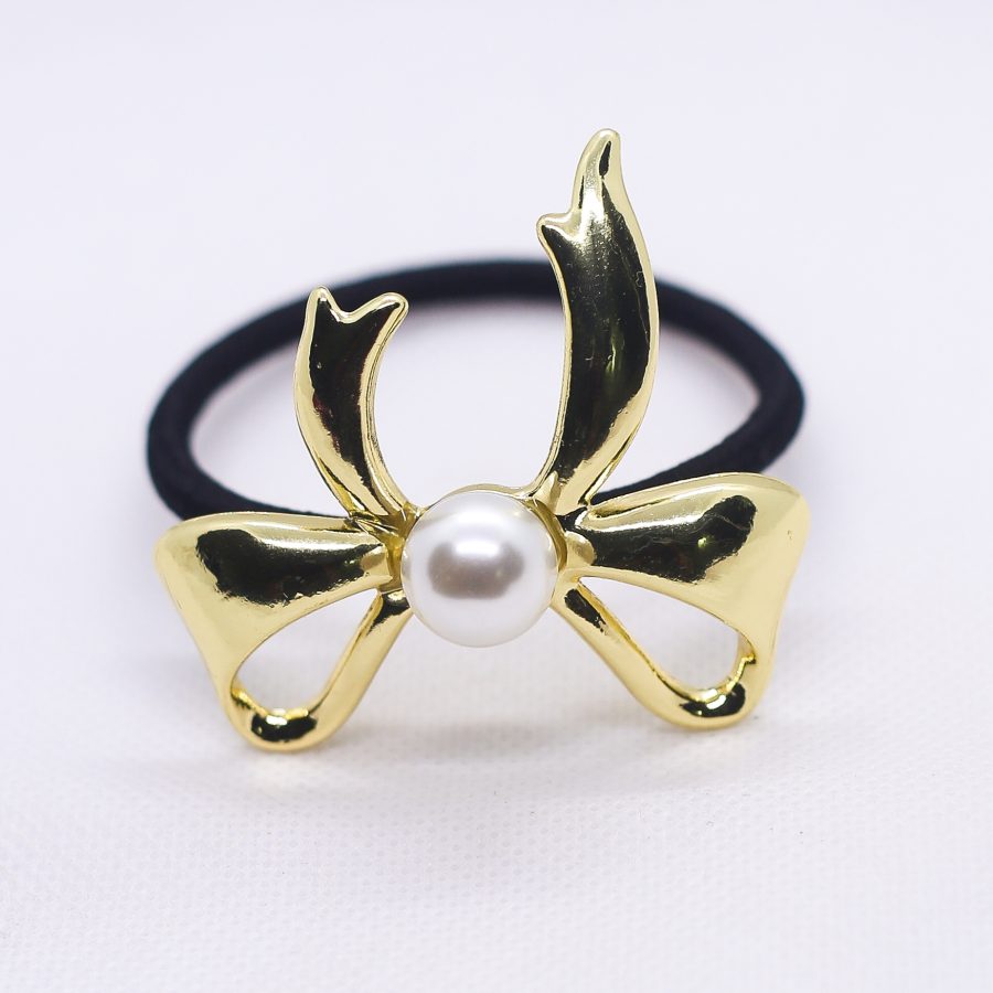 Ribbon with pearl pony cuff