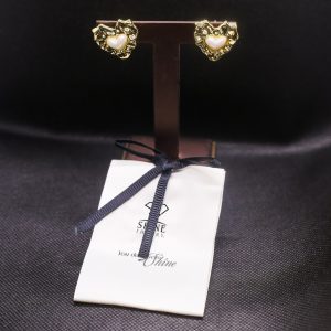Pearl encrusted heart earrings