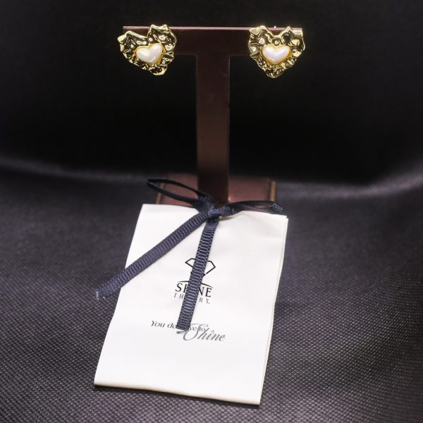 Pearl encrusted heart earrings