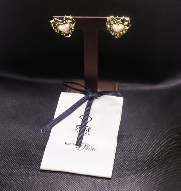 Pearl encrusted heart earrings